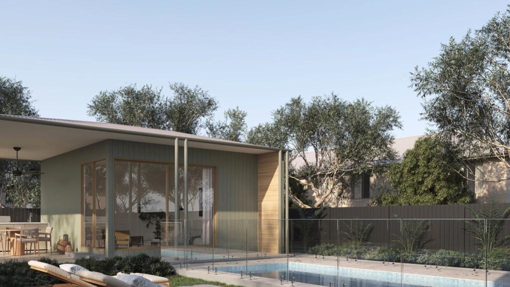 A modern new construction home next to a classic, charming existing home
